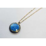 A 9ct gold chain with blue enamel compact