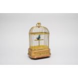A gilt metal clockwork birdcage automata