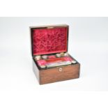 A late Victorian rosewood travelling dressing table set