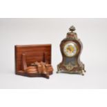 A French Boule style mantel clock and associated mahogany bracket