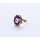 An amethyst and pearl ring