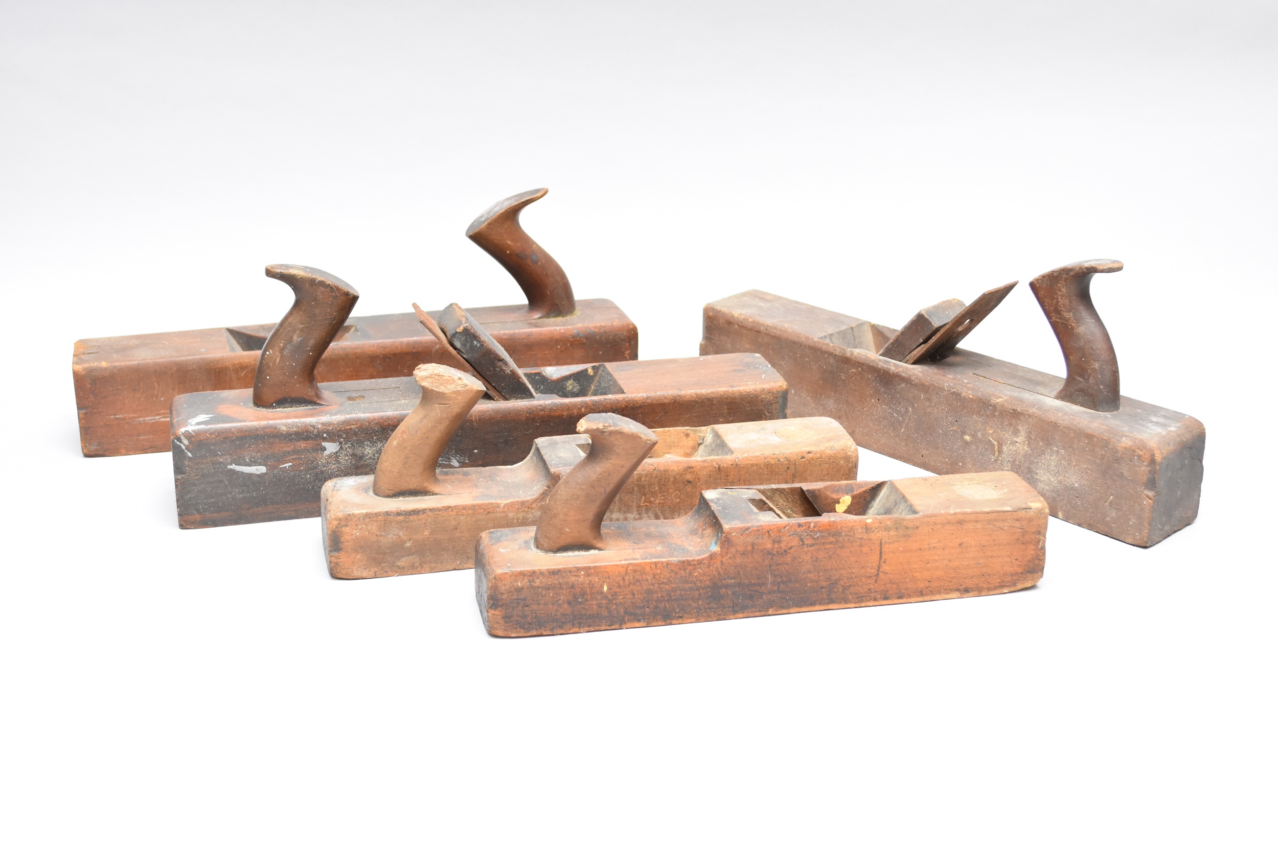 A group of five vintage wood block planes