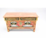 A Tibetan polychrome lacquer stool and a small curio chest