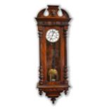 A late 19th century Austrian, walnut, weight-driven, wall clock