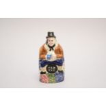 Prattware 'Old Tot' figural spirit flask