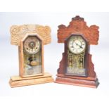 An Ingraham American 'Gingerbread' mantel clock and another similar