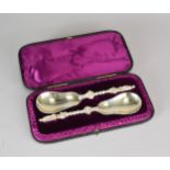 A pair of Victorian cased apostle spoons