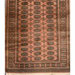 An Afghan Bokara pattern rug and a Persian pattern rug