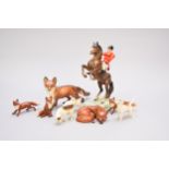 A group of Beswick comprising Huntsman, foxhounds and foxes