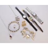 A collection of various pieces of costume jewellery