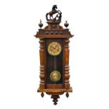 A walnut Vienna type wall clock and a rosewood effect Vienna type wall clock