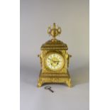 A French gilt brass mantel clock