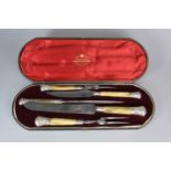 A Victorian cased silver mounted antler five piece carving set