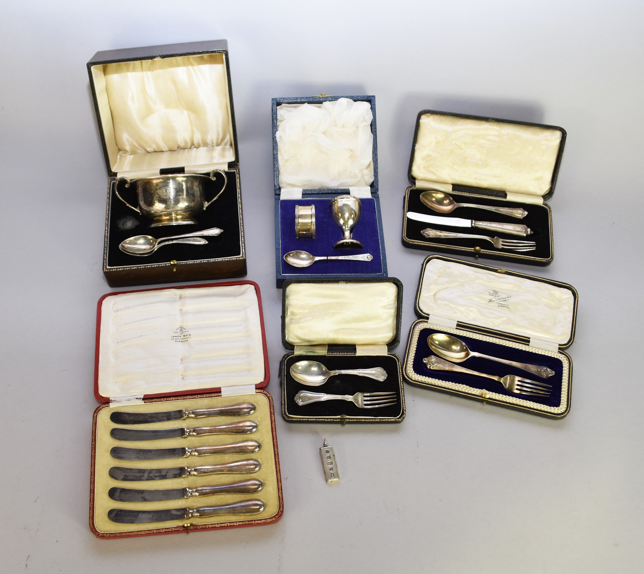 A collection of cased silver wares