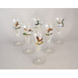 A set of six enamelled wine glasses decorated with game birds