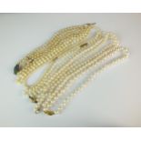 A collection of cultured pearl necklaces and simulated pearl necklaces