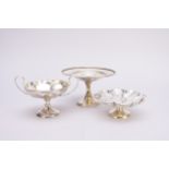 Three silver pedestal bowls