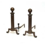 A pair of large 18th century style brass andirons, with a grate (3)
