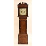 A George III inlaid oak and mahogany painted dial longcase clock