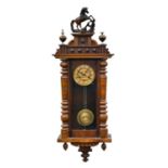 A walnut Vienna type wall clock and a rosewood effect Vienna type wall clock