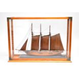 A reproduction cased model ship