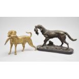 A bronze figure of a hunting dog and a similar brass figure