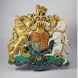 A large wall-hanging Royal coat of arms