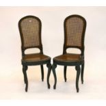 A pair of early 20th century, Louis XV style, painted, caned chairs