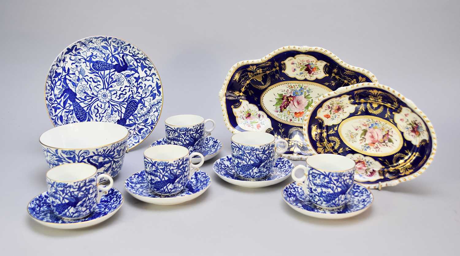 A Royal Crown Derby part service and two Derby plates