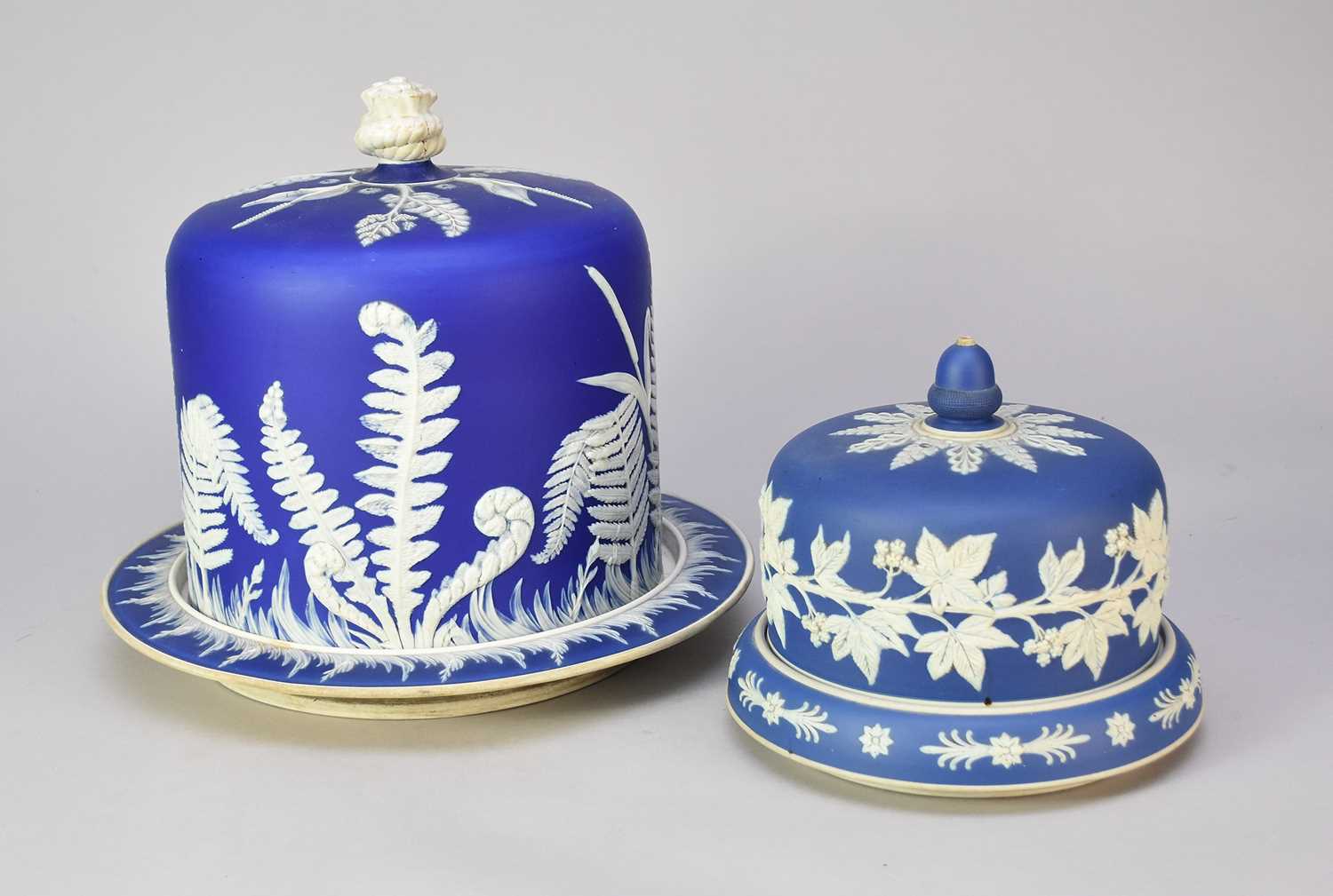 Two Staffordshire blue and white jasperware cheese domes