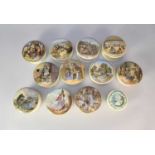 A collection of prattware pot lids with bases