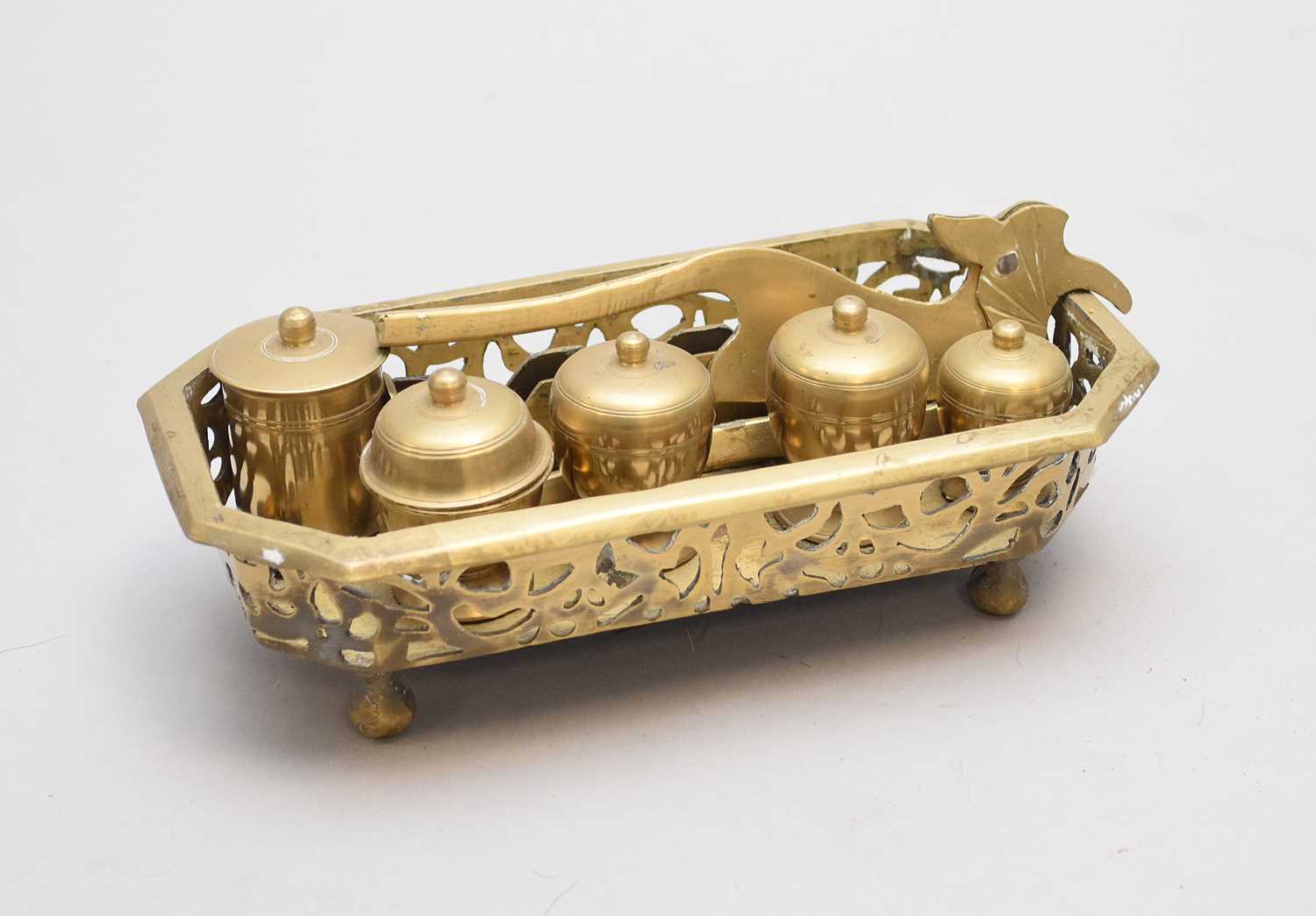 A Chinese white metal betel nut set