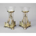 A pair of late 19th century silver plated camel table centrepieces