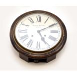 An early 20th century wall clock, Thomas Burtons, Hanley and three clock dials