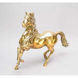 A large cast brass figure of a horse