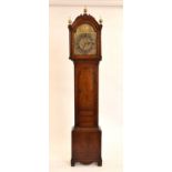 A George III inlaid oak brass dial longcase clock