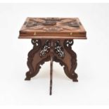 A good early 20th century, carved padouk-like card/games table