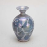 A small purple lustre vase decorated in a style similar to Alan Caiger-Smith