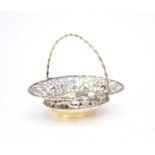 An Edwardian silver swing handled basket by William Comnys