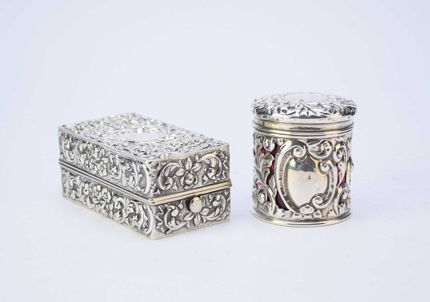 A Victorian silver travelling ink well case and a silver dressing table jar