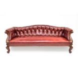 A Victorian mahogany framed leather button-back sofa