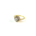 An 18ct gold diamond cluster ring