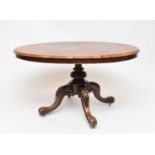 A Victorian figured walnut, oval loo table