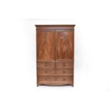 A George III mahogany press cupboard converted to wardrobe