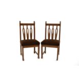 A set of four German or Austrian oak side chairs, inter-war period
