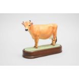Royal Worcester Jersey Cow and a miniature service decorated with through