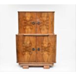 An inter-war period art deco style walnut cocktail cabinet