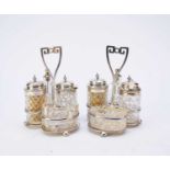 A pair of silver cruet sets