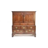 A George III oak livery cupboard