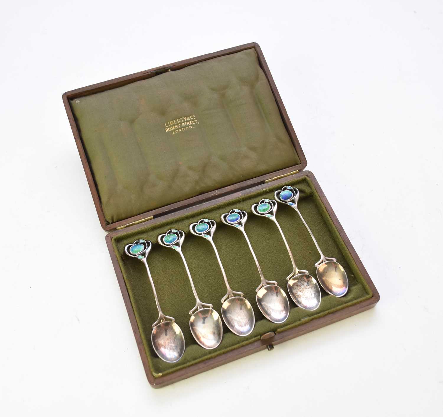 A cased set of Liberty & Co Art Nouveau silver and enamel teaspoons